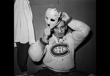 Hockey goalie in the mask. Goalkeeper in an old hockey mask Stock