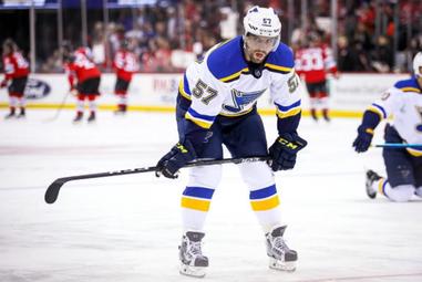 St. Louis Blues left wing David Perron (57) skates against the Dallas Stars  during the first period of an NHL hockey game Sunday, Jan. 9, 2022, in St.  Louis. (AP Photo/Joe Puetz