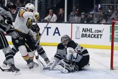 Los Angeles Kings goaltender Jonathan Quick protects the goal during the  first period of an NHL hockey game against the Arizona Coyotes Monday, May  3, 2021, in Glendale, Ariz. (AP Photo/Ross D.