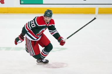 Michael McLeod of the New Jersey Devils skates against the New