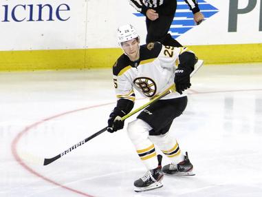 The Boston Bruins has locked up defenceman Brandon Carlo long-term