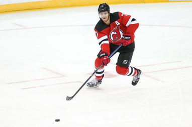 Dougie Hamilton wearing the Hat hat, in reference to the Devils' new  alternate Jersey jersey : r/hockey