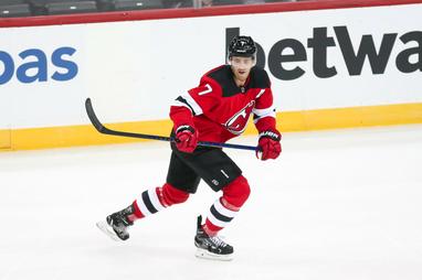 Dougie Hamilton wearing the Hat hat, in reference to the Devils' new  alternate Jersey jersey : r/hockey