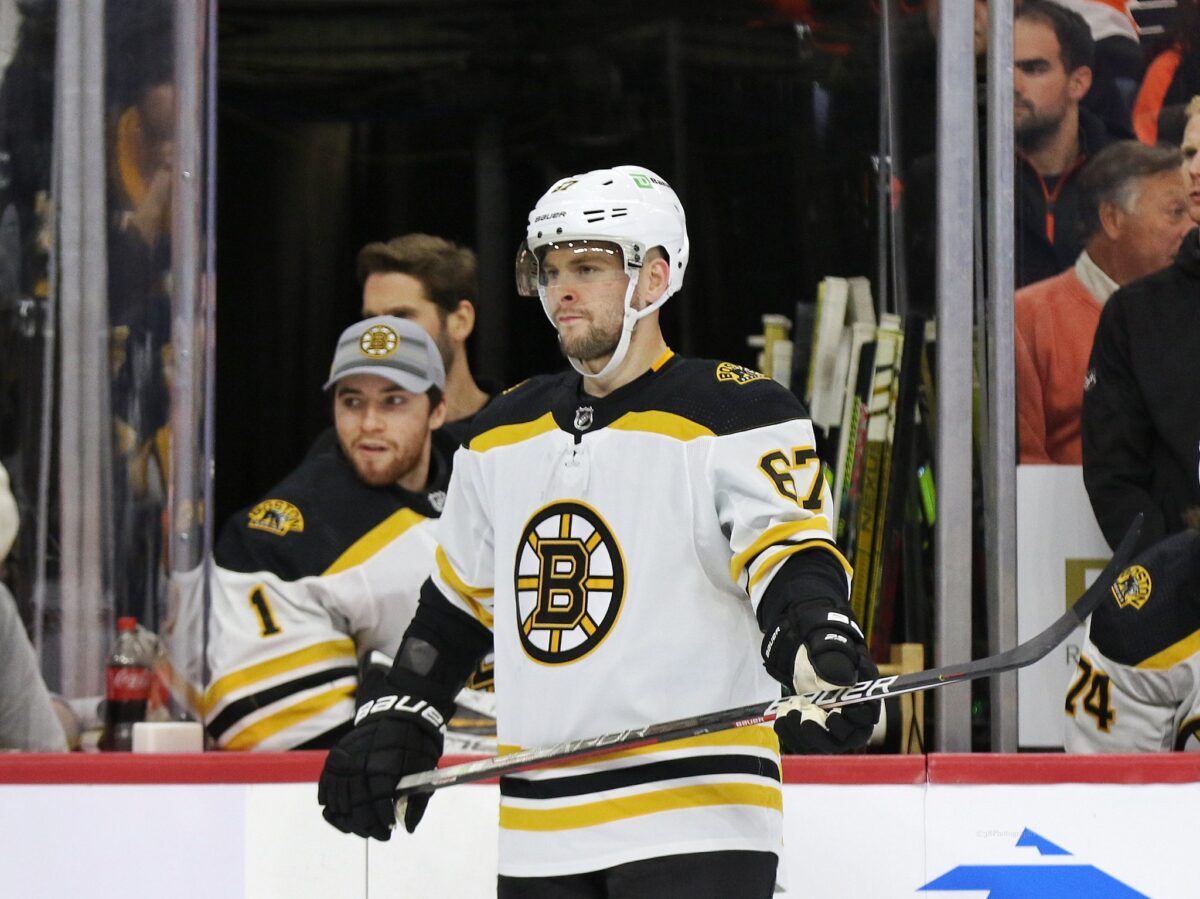 Conor Ryan on X: Here's Patrice Bergeron wearing the new Bruins jersey  with the Rapid7 patch:  / X