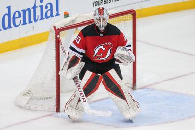 Devils' Daws shuts door with 24 saves to win NHL debut