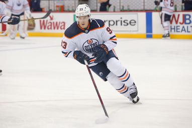 Connor McDavid reaches 100 points, Oilers beat Canucks 4-3